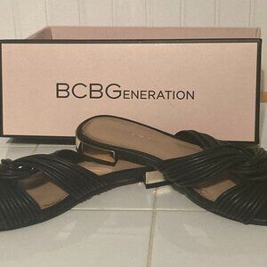 BCBGeneration Dineras Black PU slides with Gold heel accent size 6/36